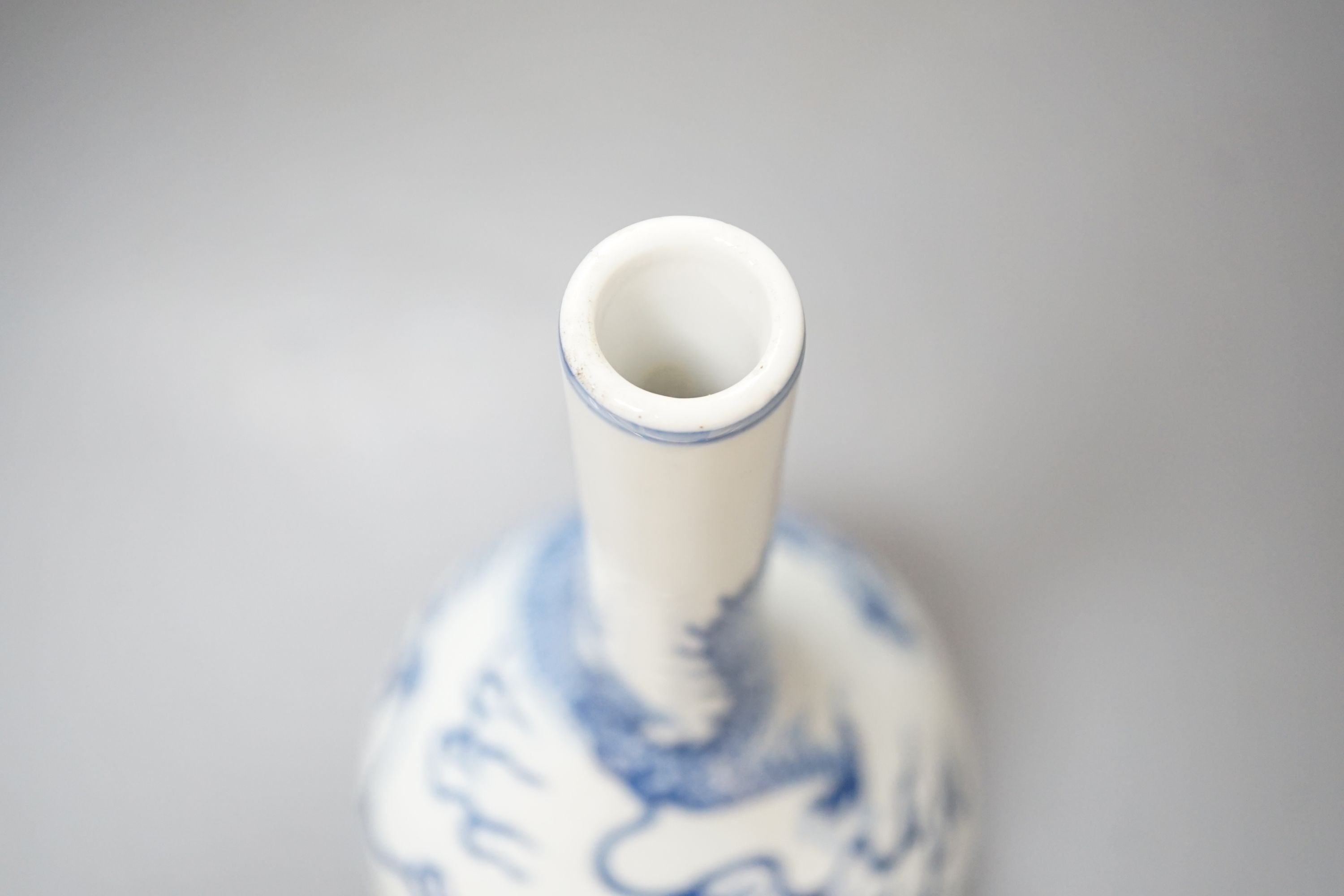 A Chinese blue and white ‘dragon’ bottle vase, 25cm